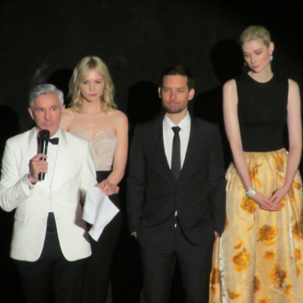 Baz Luhrmann giving a speech at the Great Gatsby premiere with  Carey Mulligan, Tobey Maguire and Elizabeth Debicki.