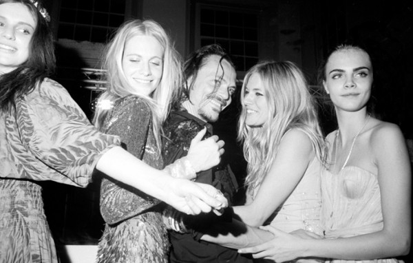 Poppy with friends (including Sienna Miller and her sister Cara).