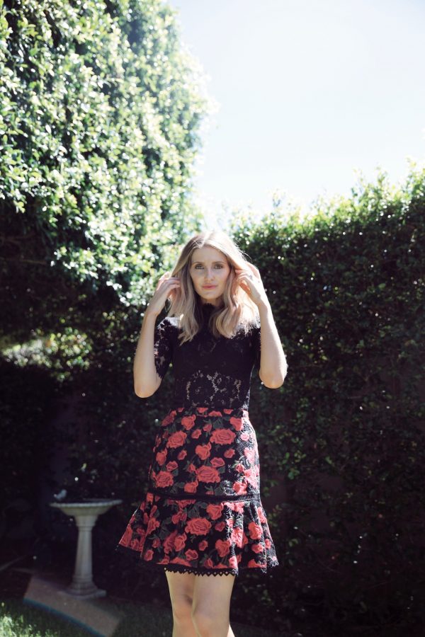 Kate Waterhouse in a garden wearing Rodeo show Uma top and Rodeo Show rosette skirt