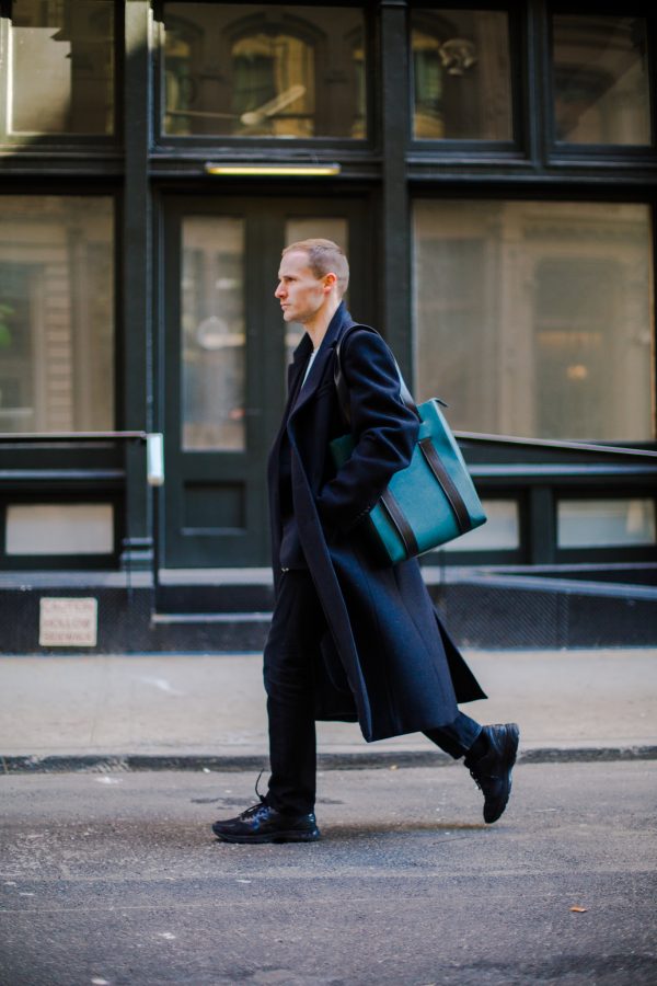 Dion Lee in New York with the tote bag from his The Daily Edited capsule collection