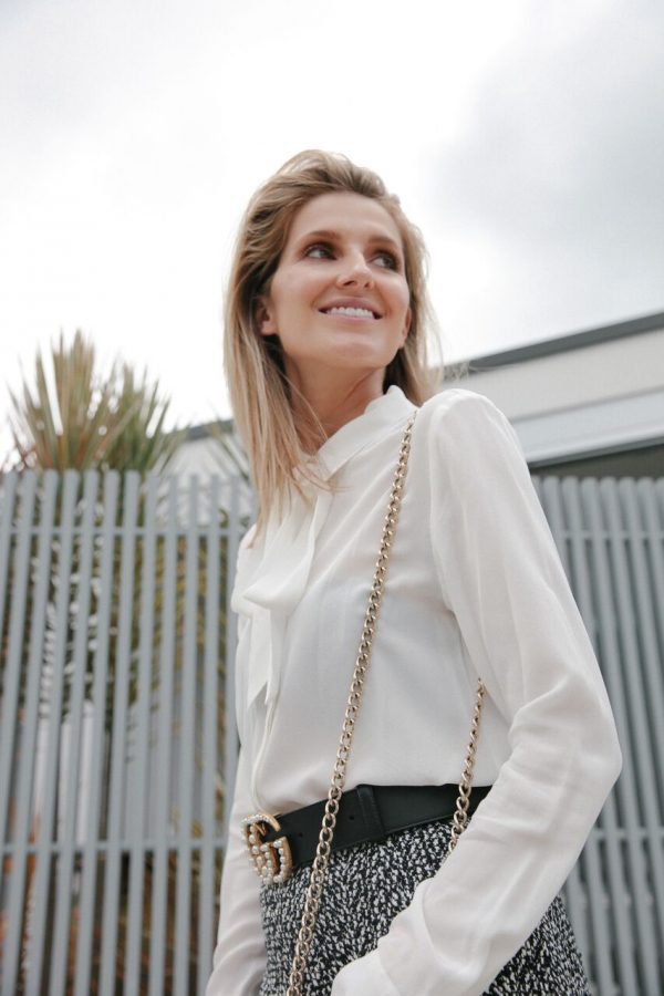 Kate Waterhouse street style close up of Banded Together shirt